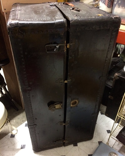 Steamer trunk #2 black with green interior. 
42"X22"X21 No key but case closes and latches shut