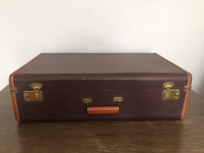 Brown no brand suitcase, lower quality 25.5"X17.5'X7 1930s, 1940s  Exterior has scratches and scuff marks