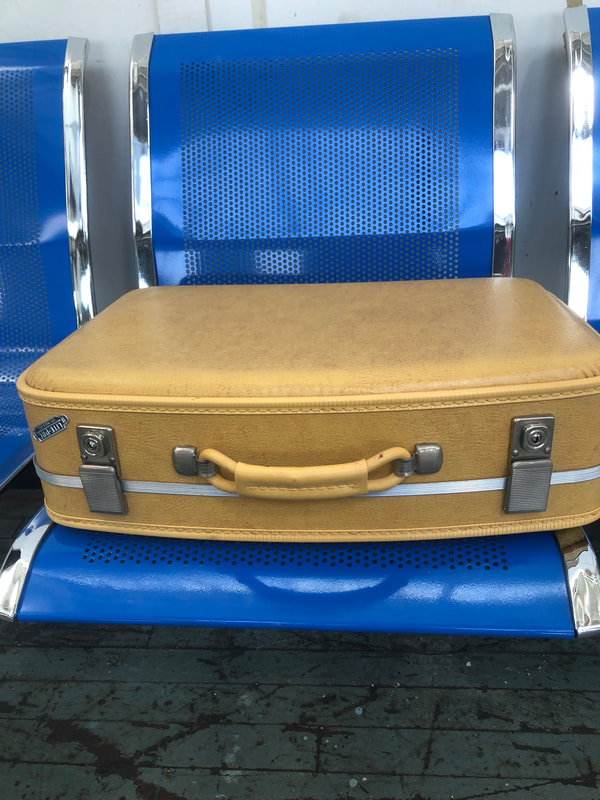 1970s yellow suitcase